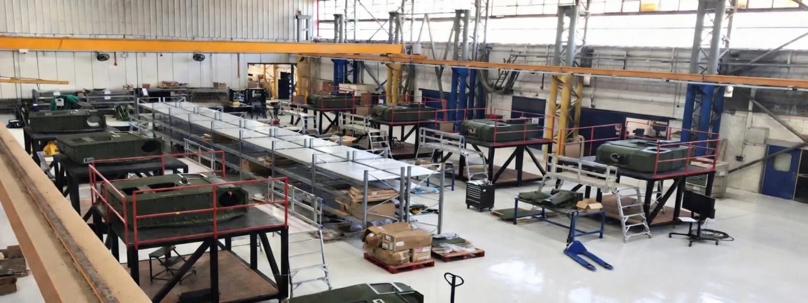 MMI turret assembly and manufacturing facility